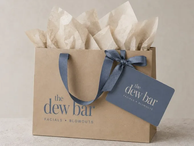 The Dew Bar gift card with gift bag for Hydrafacial facials and blowouts