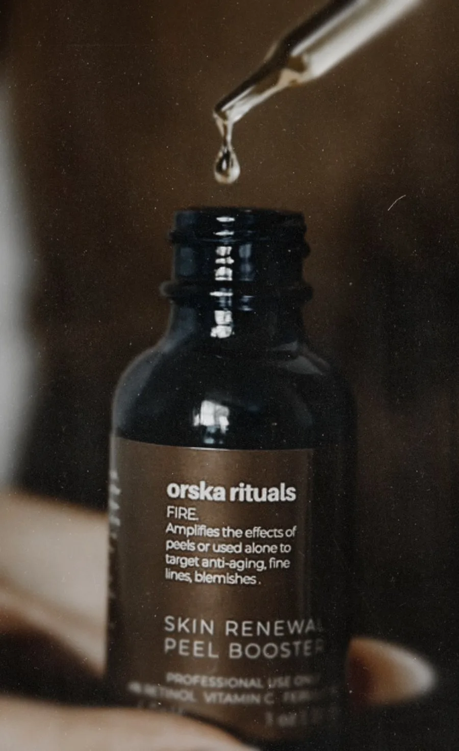 Orska Rituals FIRE Skin Renewal Peel Booster serum with retinol and vitamin C, used at The Dew Bar